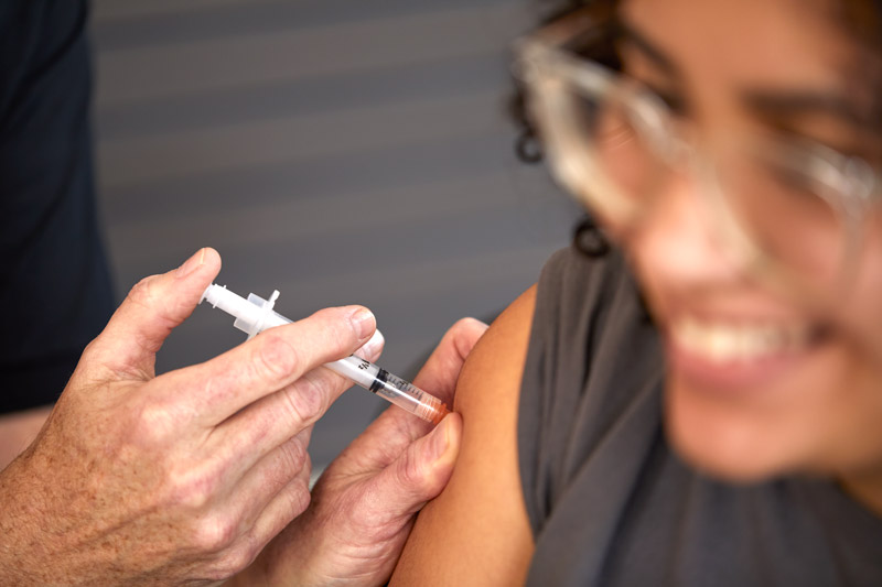 A Friendly Pharmacy patient receives a Vaccine Treatment easily scheduled, in Greensboro.